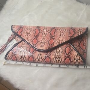 Elegant Snake Print Wristlet - Coral